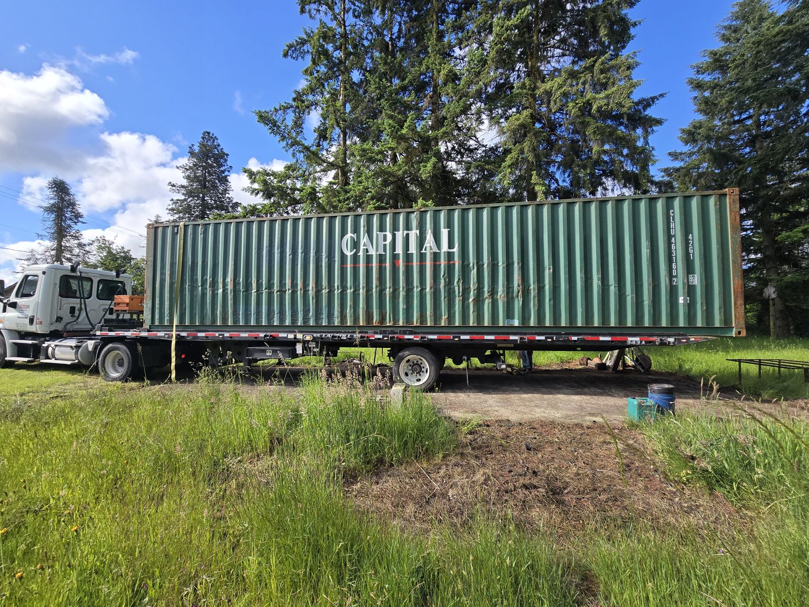 Numbered bags, drums and boxes packed carefully inside a container